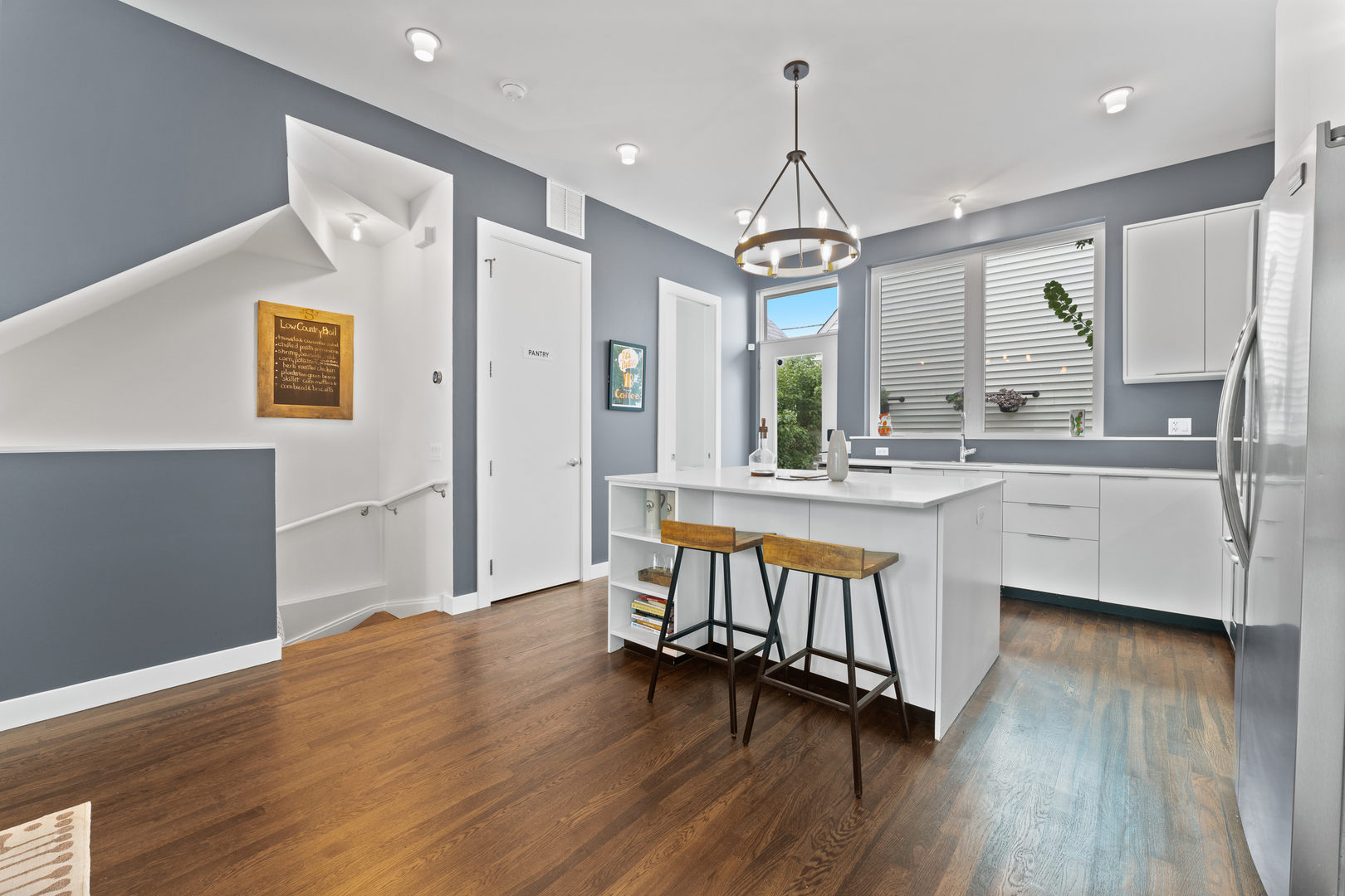 3650 North Kenneth Avenue Chicago, IL 60641 - Photo 8 of 39 a large kitchen with a table and chairs
