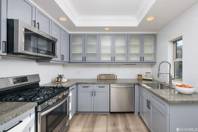 a bedroom with a bed and a cabinets