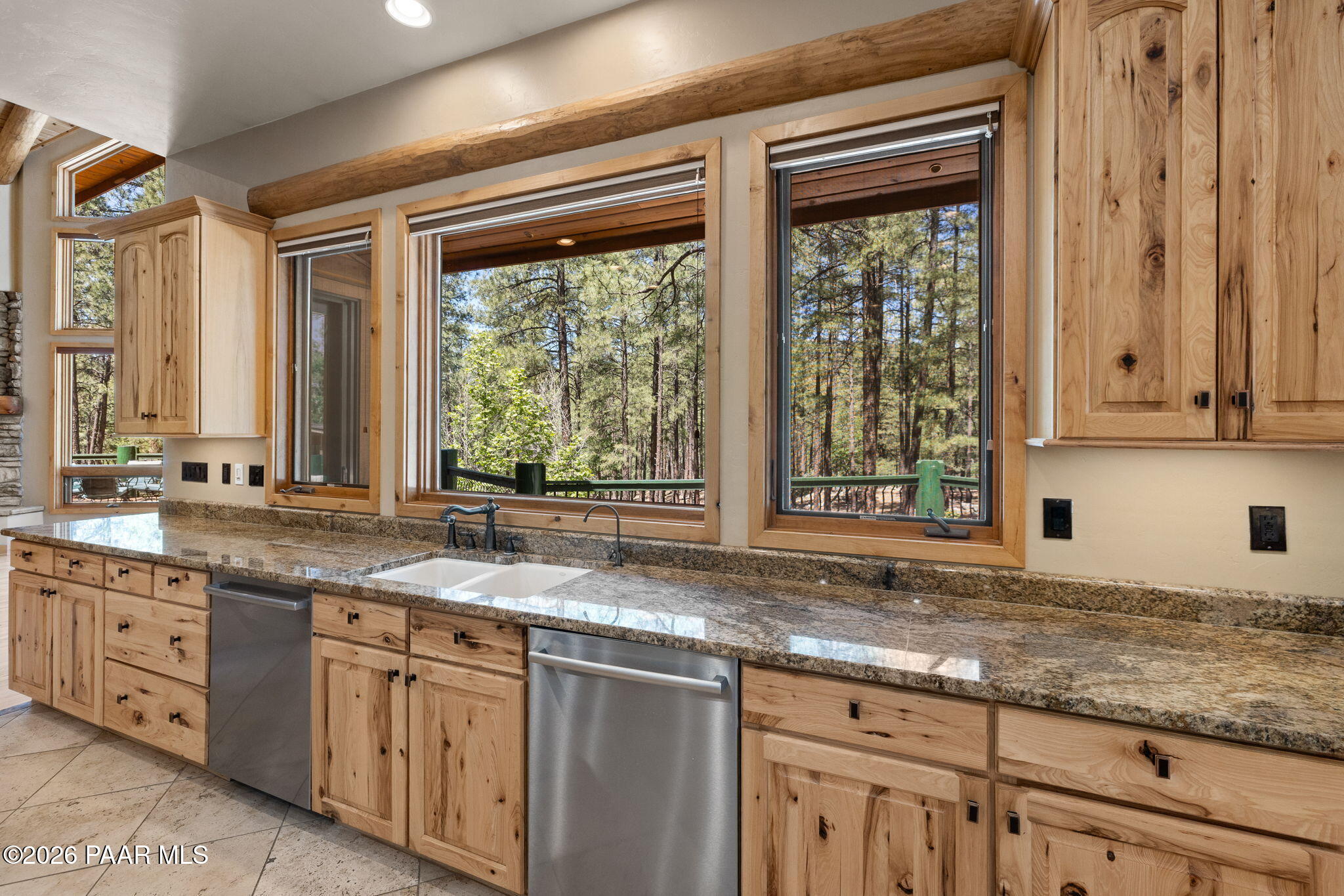 5140 East Charcoal Kiln Road Prescott, AZ 86303 - Photo 28 of 140 a kitchen with granite countertop a sink and a window