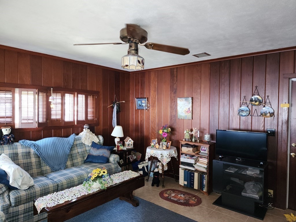 169 Newton Road Springfield, MA 01118 - Photo 24 of 31 a living room with furniture and a flat screen tv