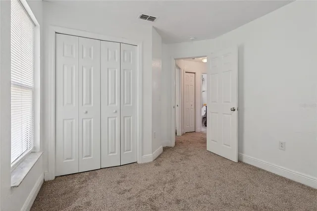 a bathroom with a sink and vanity