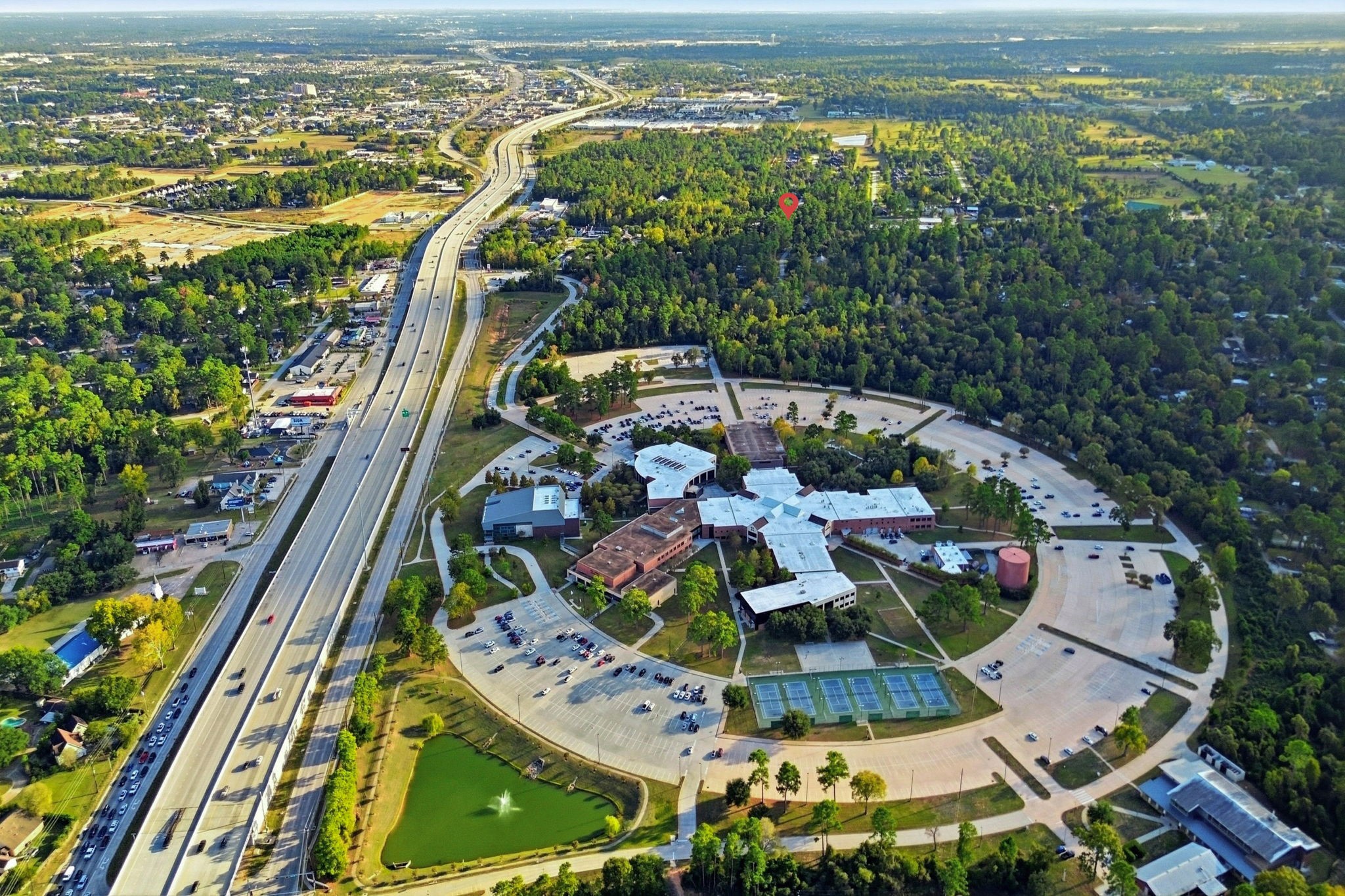 0 Keen Road Tomball, TX 77377 - Photo 15 of 16 an aerial view of residential houses with outdoor space