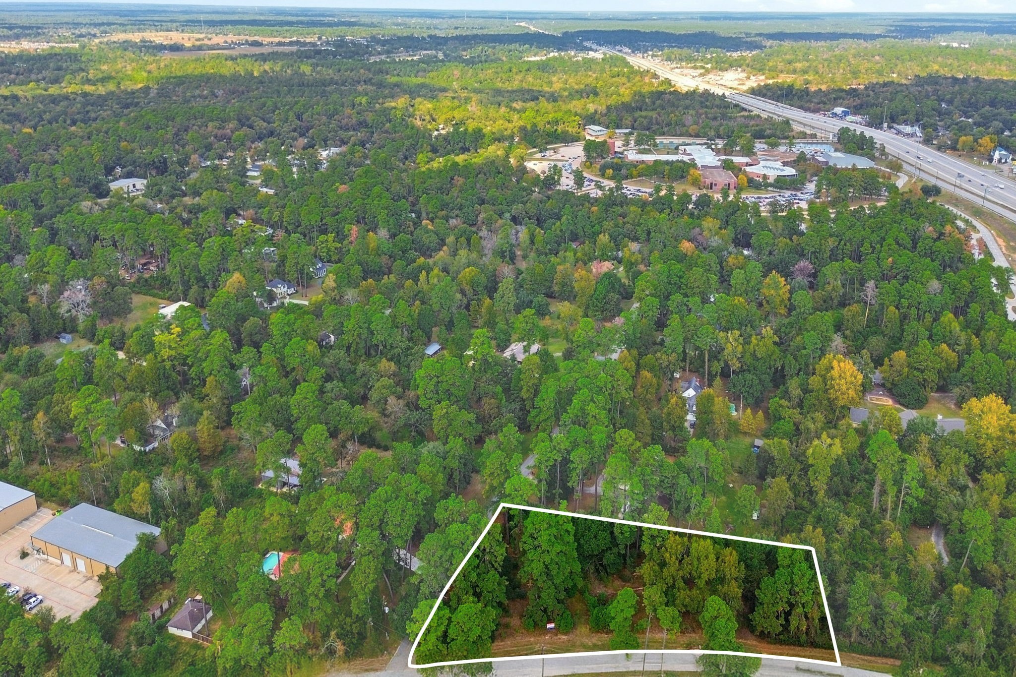 0 Keen Road Tomball, TX 77377 - Photo 8 of 16 a view of a city from a lake