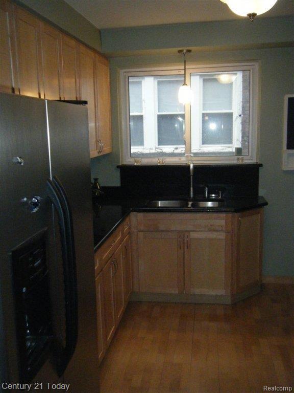 Galley Kitchen with Tall Cabinet