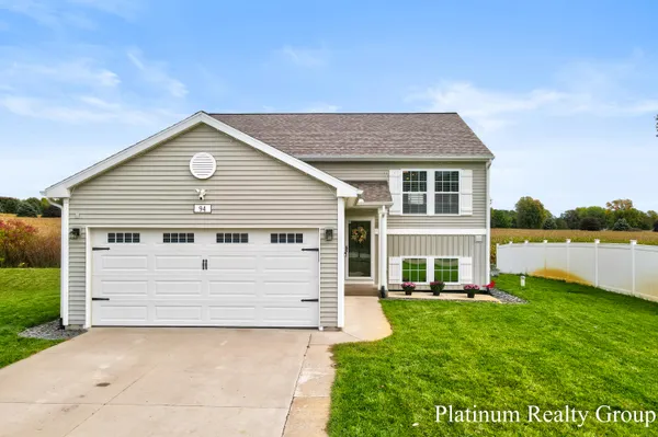 $320,500 | 94 Sweet Meadow Drive, Kent City, MI 49330