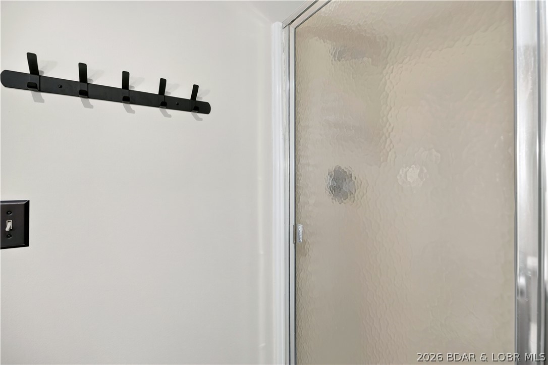 2084 Spring Cove Road Sunrise Beach, MO 65079 - Photo 40 of 63 Lower level bathroom