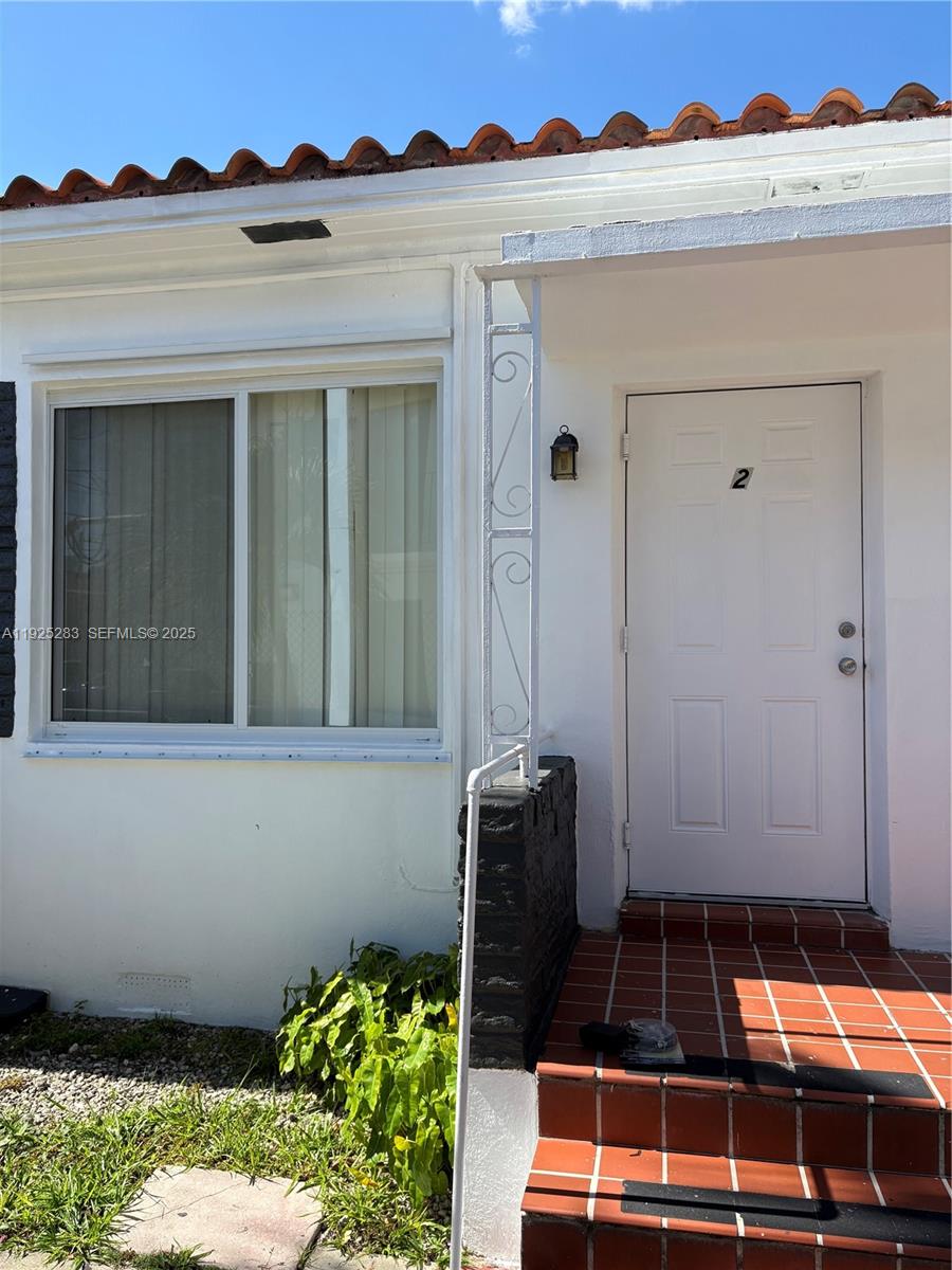 1035 Southwest 3rd Street, Unit 2 Miami, FL 33130 - Photo 3 of 13 a front view of a house