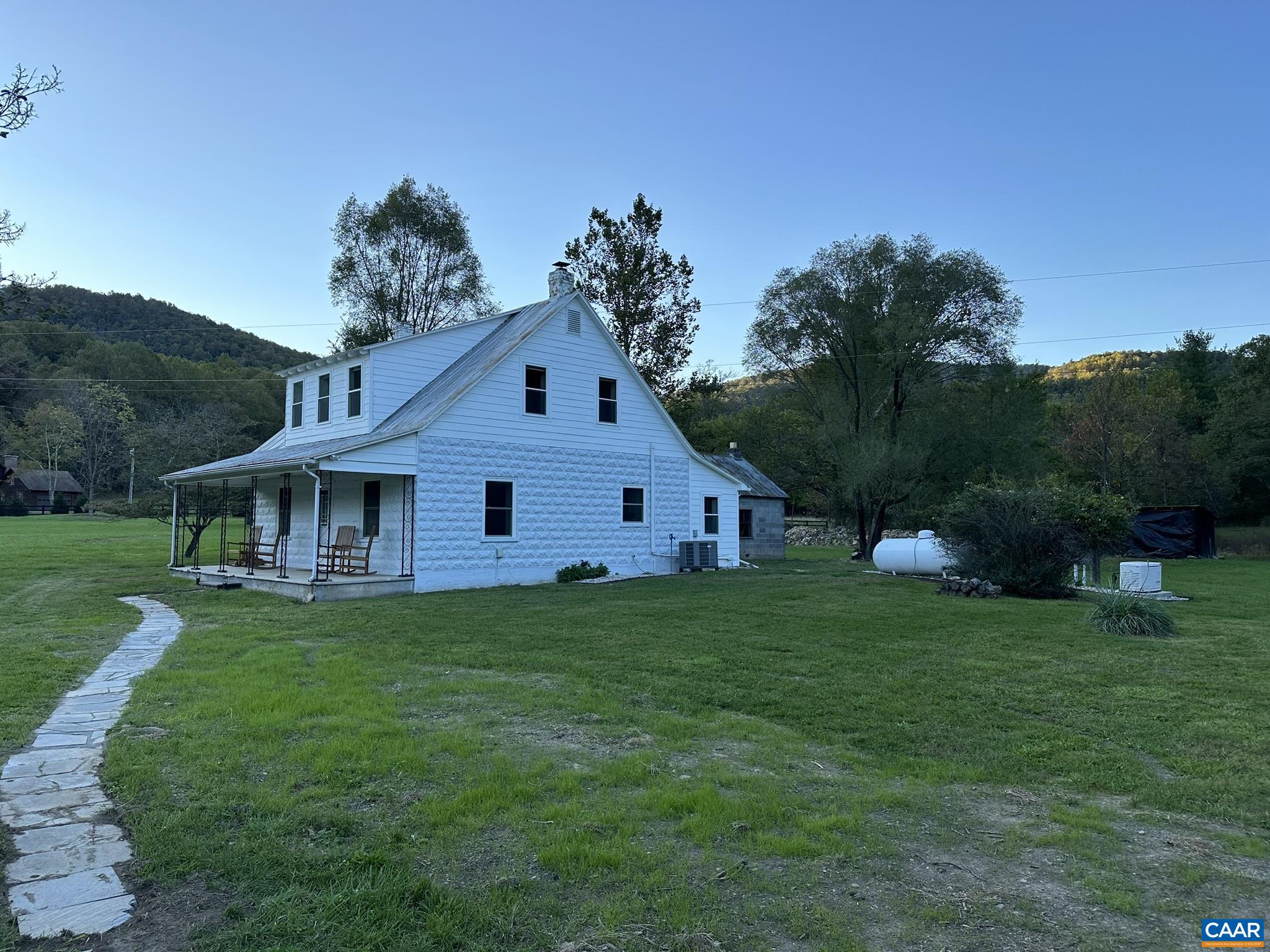 8817 Mission Home Road Free Union, VA 22940 - Photo 22 of 26 a front view of a house with garden