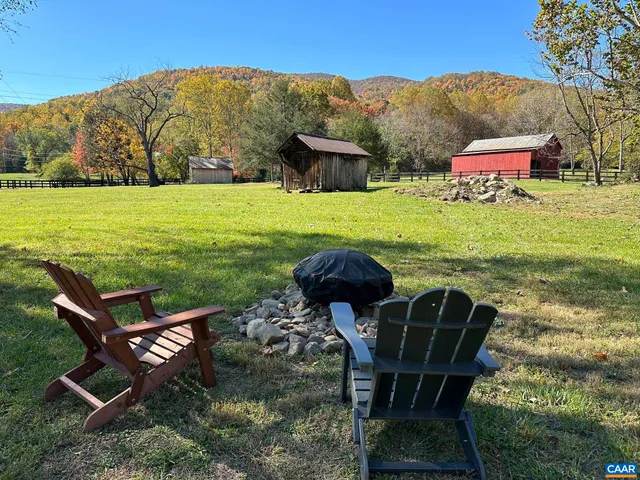 a view of a chairs and table on the terrace