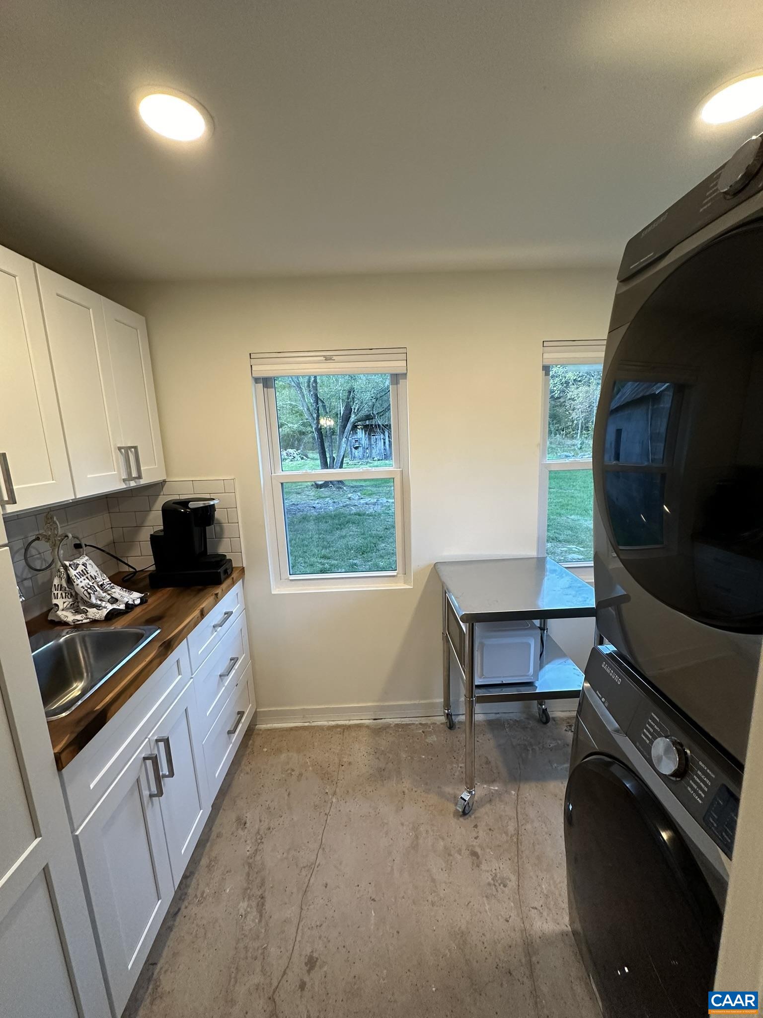 8817 Mission Home Road Free Union, VA 22940 - Photo 9 of 26 a kitchen with a sink and a stove top oven