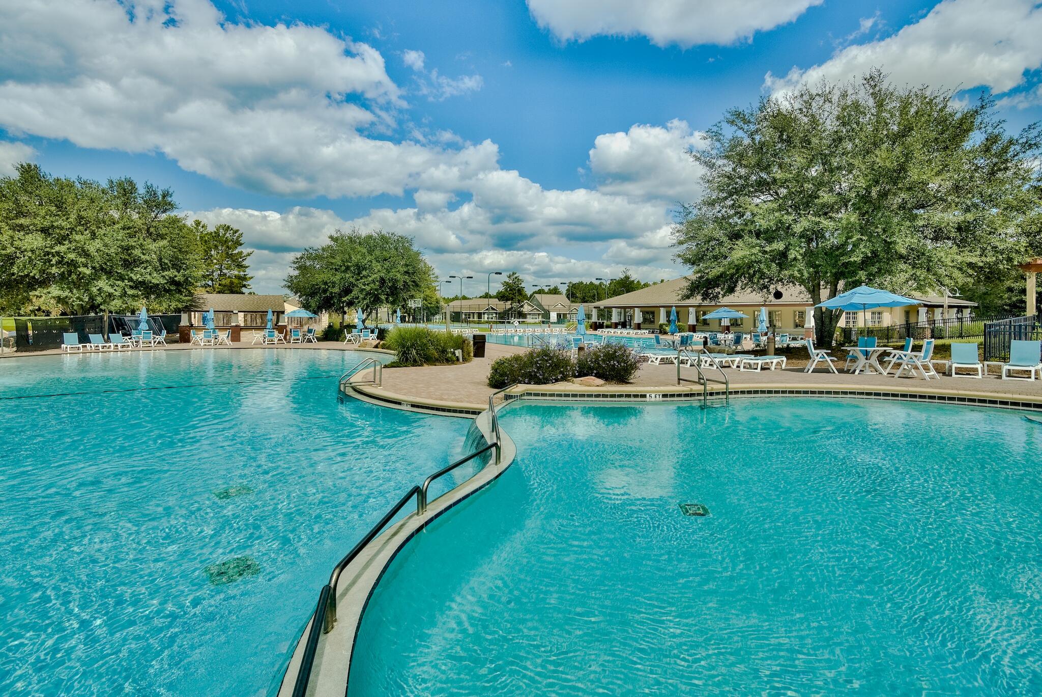369 Lilly Bell Lane Freeport, FL 32439 - Photo 21 of 24 a view of a lake with houses