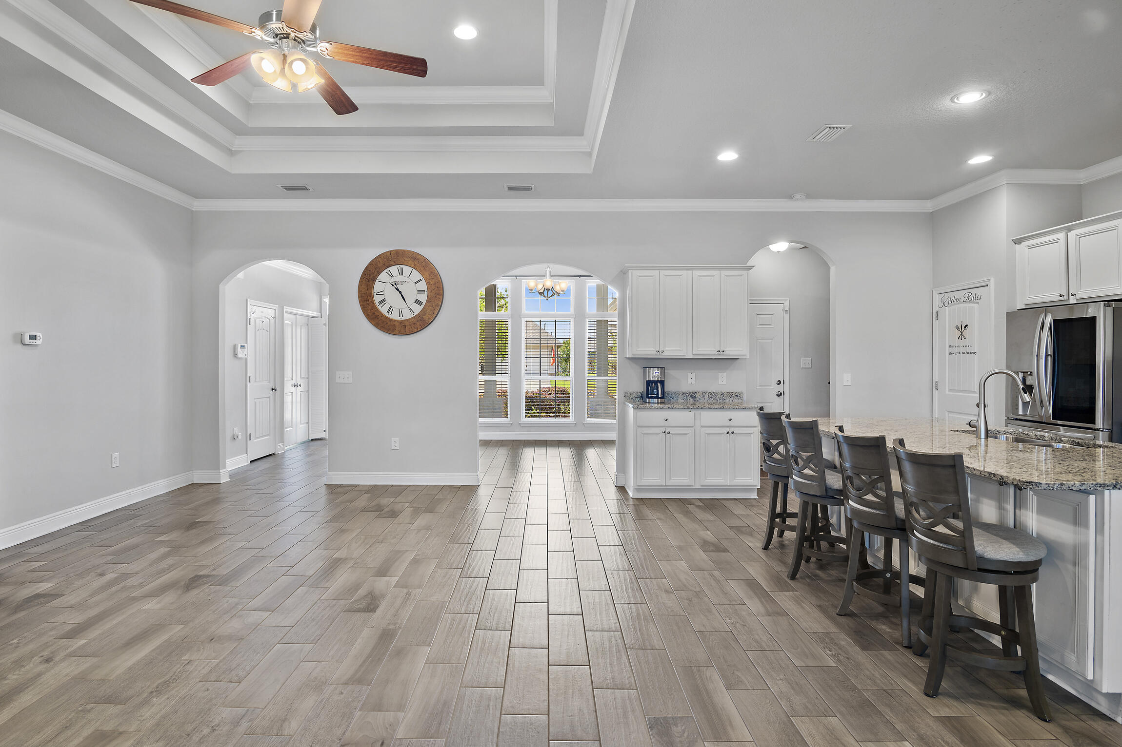 369 Lilly Bell Lane Freeport, FL 32439 - Photo 7 of 24 a view of kitchen with cabinets and wooden floor