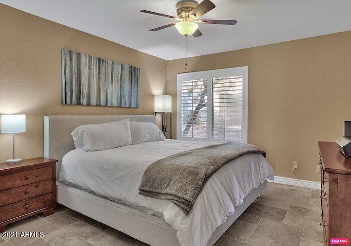 3500 North Hayden Road, Unit 1511 Scottsdale, AZ 85251 - Photo 13 of 26 a bedroom with a bed and window