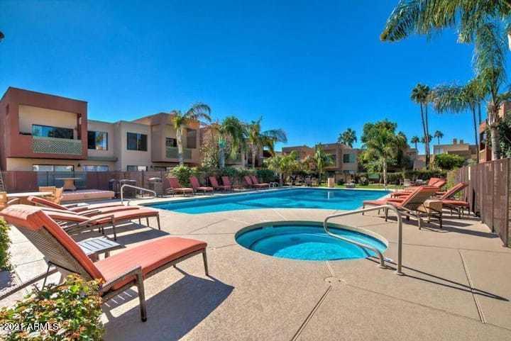 3500 North Hayden Road, Unit 1511 Scottsdale, AZ 85251 - Photo 26 of 26 a view of a swimming pool with a lounge chairs