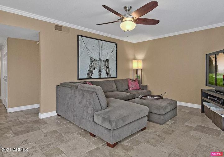 3500 North Hayden Road, Unit 1511 Scottsdale, AZ 85251 - Photo 4 of 26 a living room with furniture and a ceiling fan