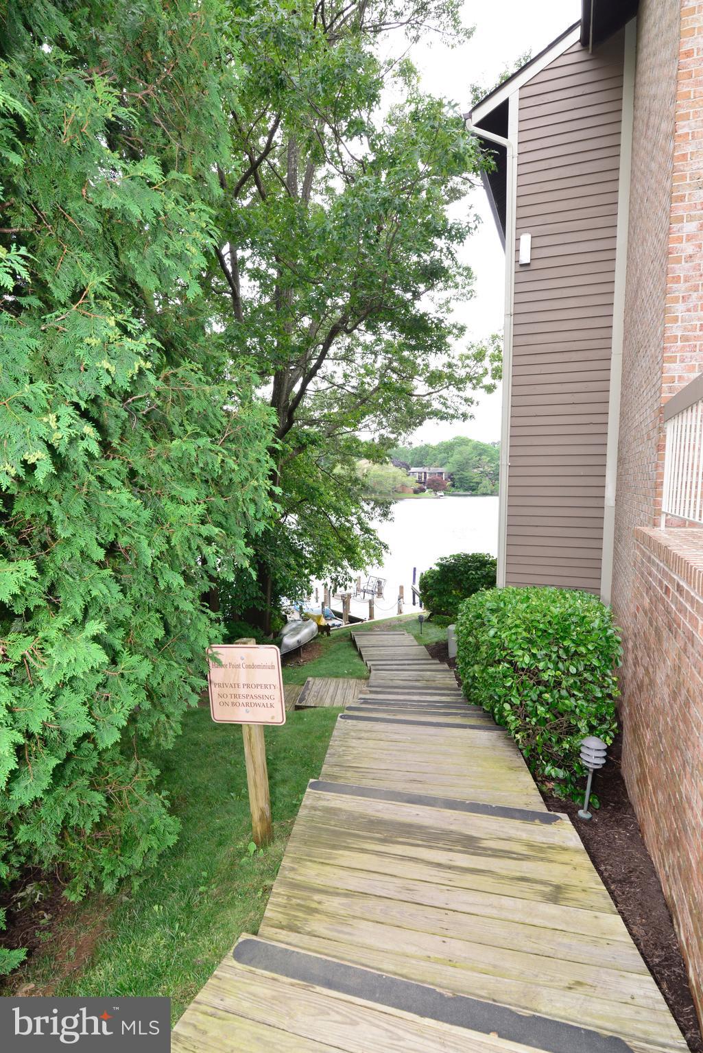 11128 Harbor Court Reston, VA 20191 - Photo 32 of 44 Steps lead to the dock and shoreline.