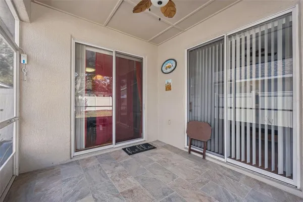 a view of workspace with window and furniture