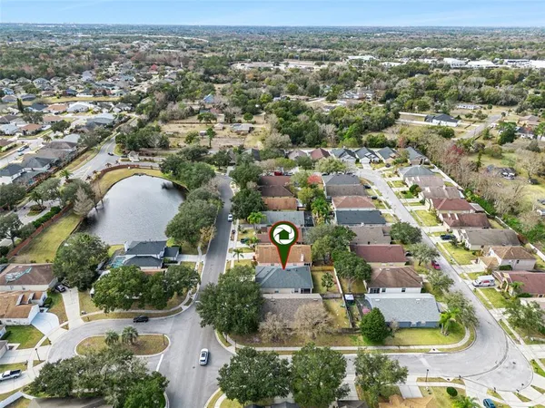 an aerial view of residential building and parking space