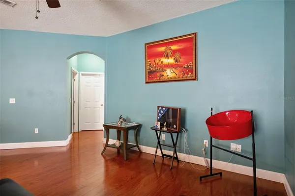 a workspace with furniture and wooden floor