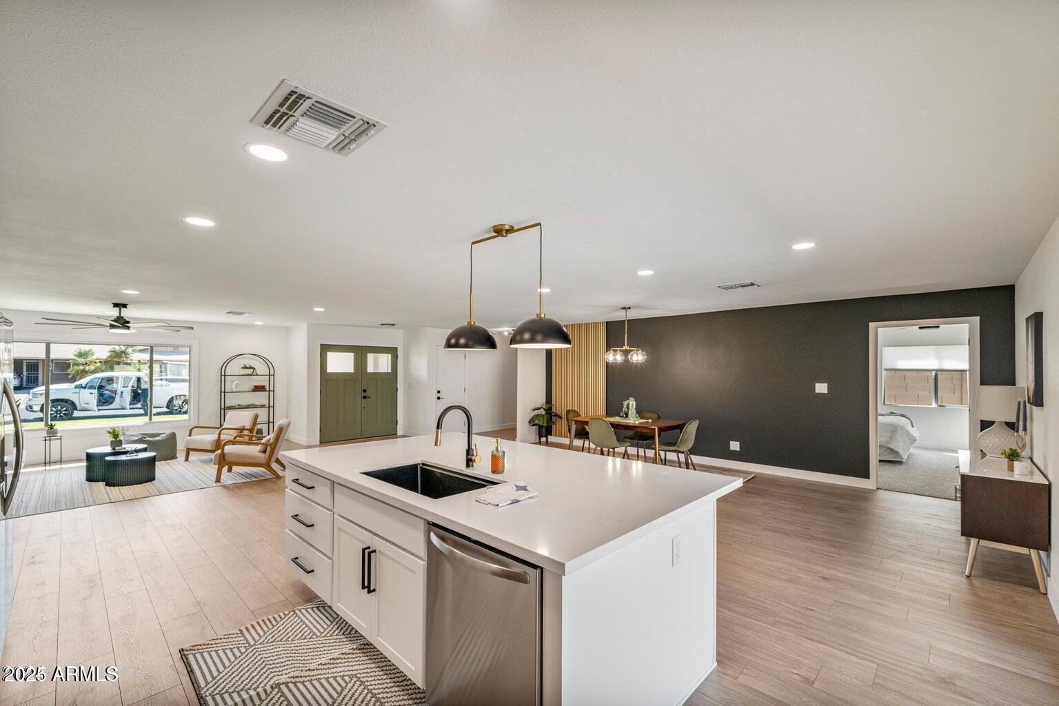 4414 South Terrace Road Tempe, AZ 85282 - Photo 11 of 24 a large kitchen with a table and chairs