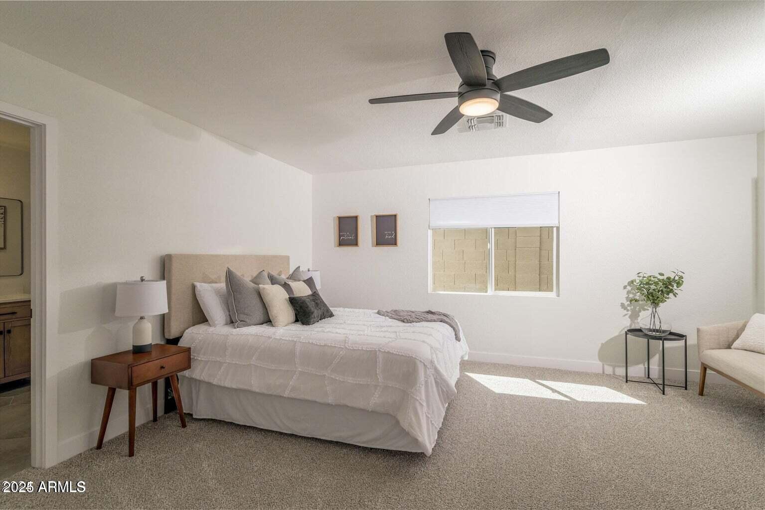 4414 South Terrace Road Tempe, AZ 85282 - Photo 14 of 24 a bedroom with a bed furniture and a window