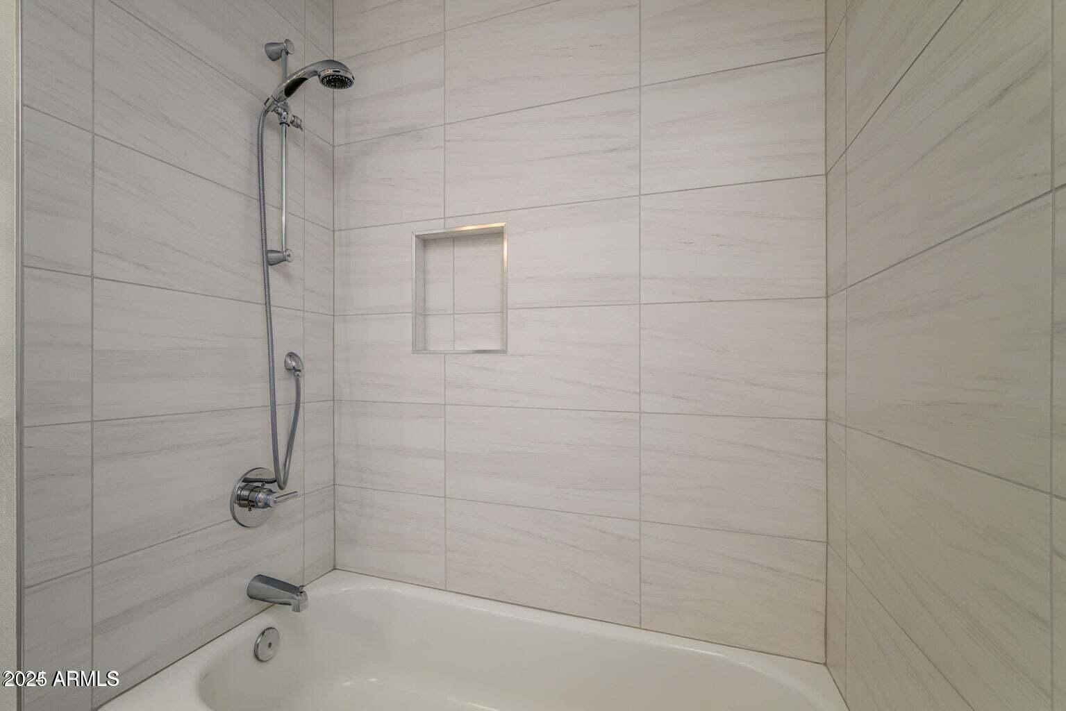 4414 South Terrace Road Tempe, AZ 85282 - Photo 20 of 24 a bathroom with a shower and a bathtub