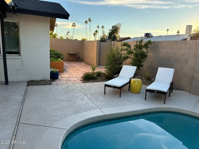 a view of a terrace with chairs