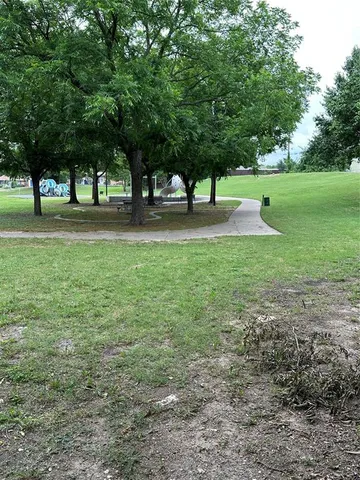 a view of park with trees