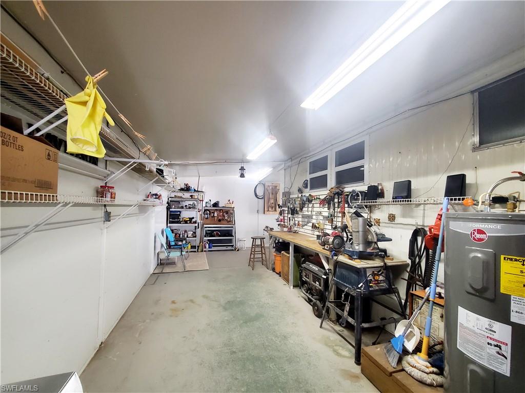 91 Enchanting Boulevard, Unit E91 Naples, FL 34112 - Photo 22 of 23 a view of a storage in a room