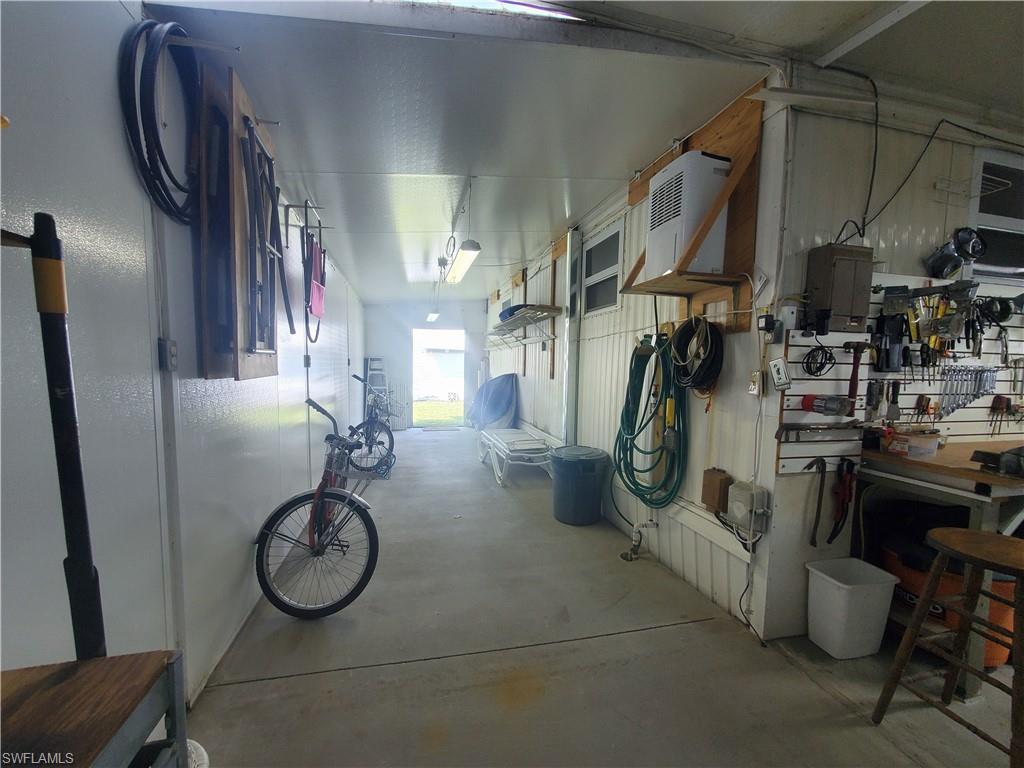 91 Enchanting Boulevard, Unit E91 Naples, FL 34112 - Photo 23 of 23 a view of water heater room