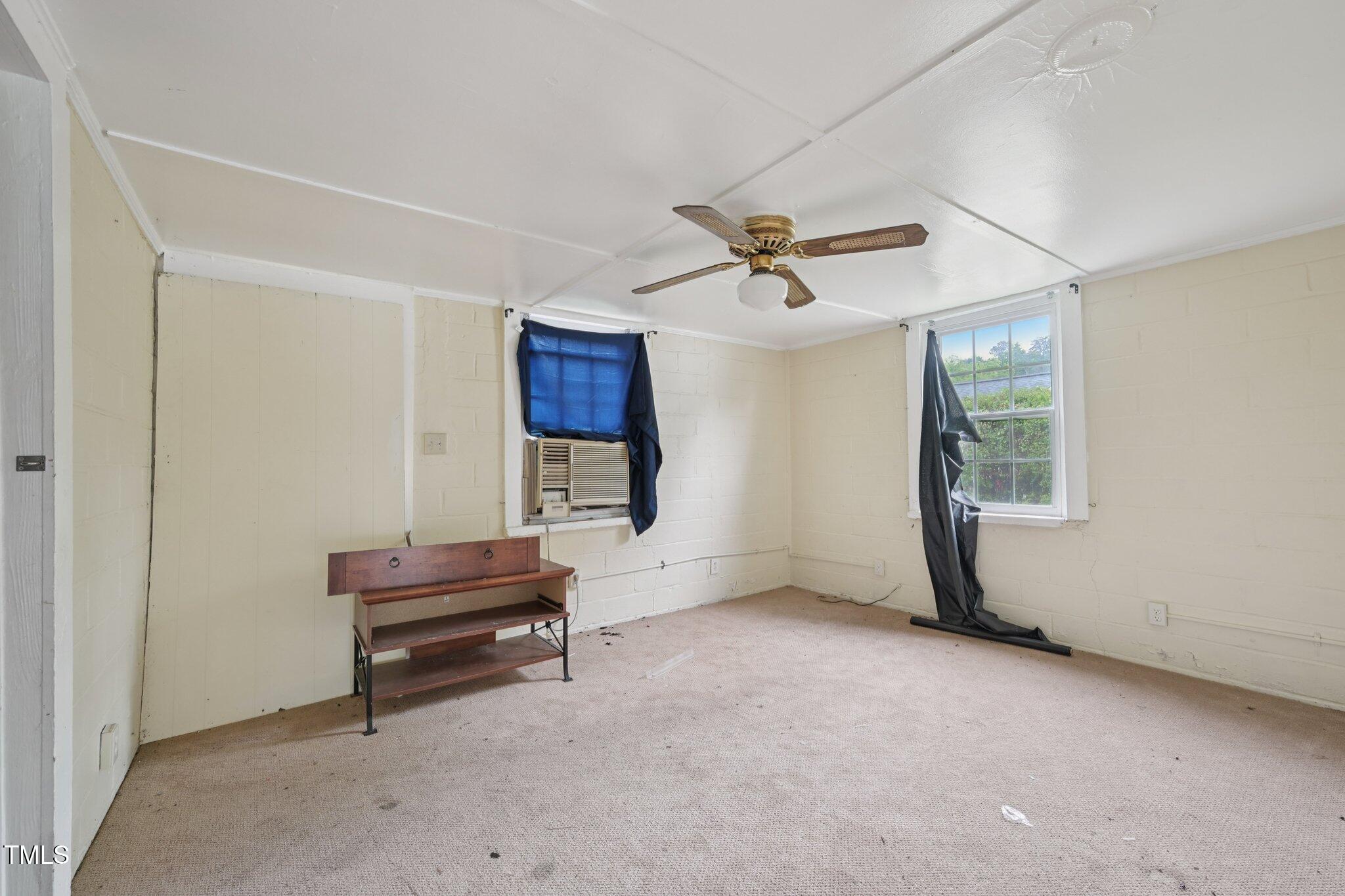 620 McAdams Road Hillsborough, NC 27278 - Photo 7 of 24 a view of room with window and ceiling fan