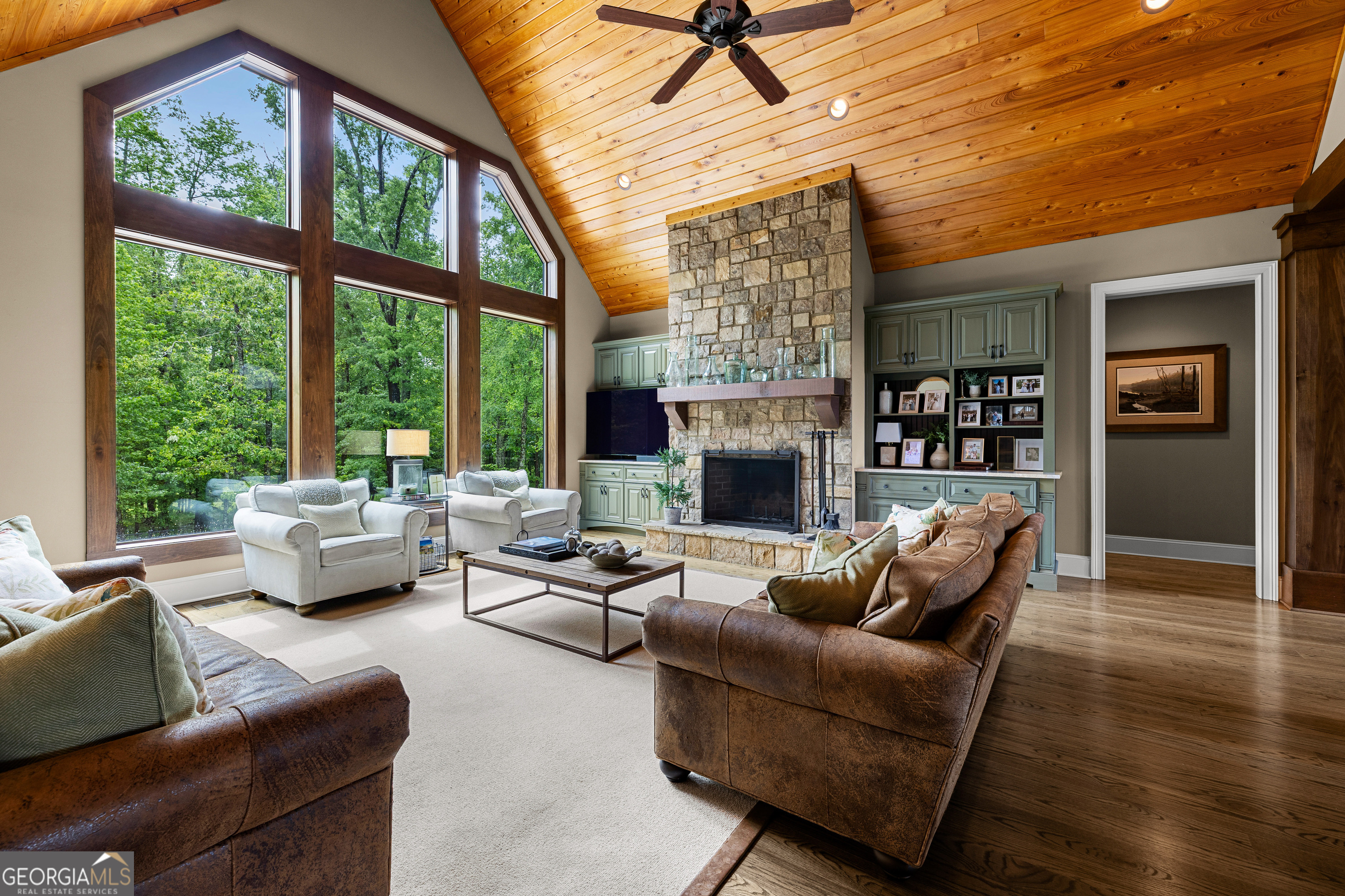 752 Grant Road Brooks, GA 30205 - Photo 23 of 132 a living room with furniture and a fireplace