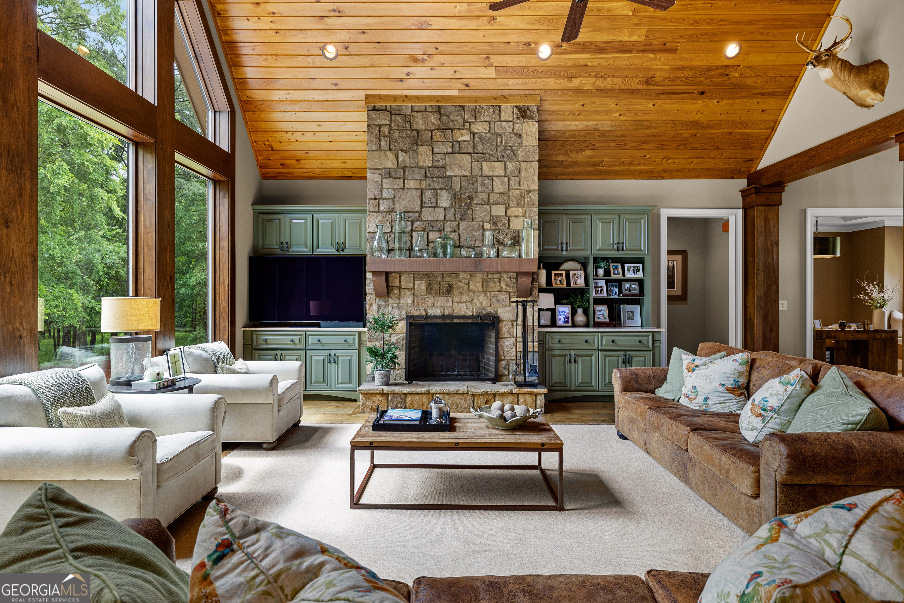 752 Grant Road Brooks, GA 30205 - Photo 27 of 132 a living room with furniture fireplace and a large window