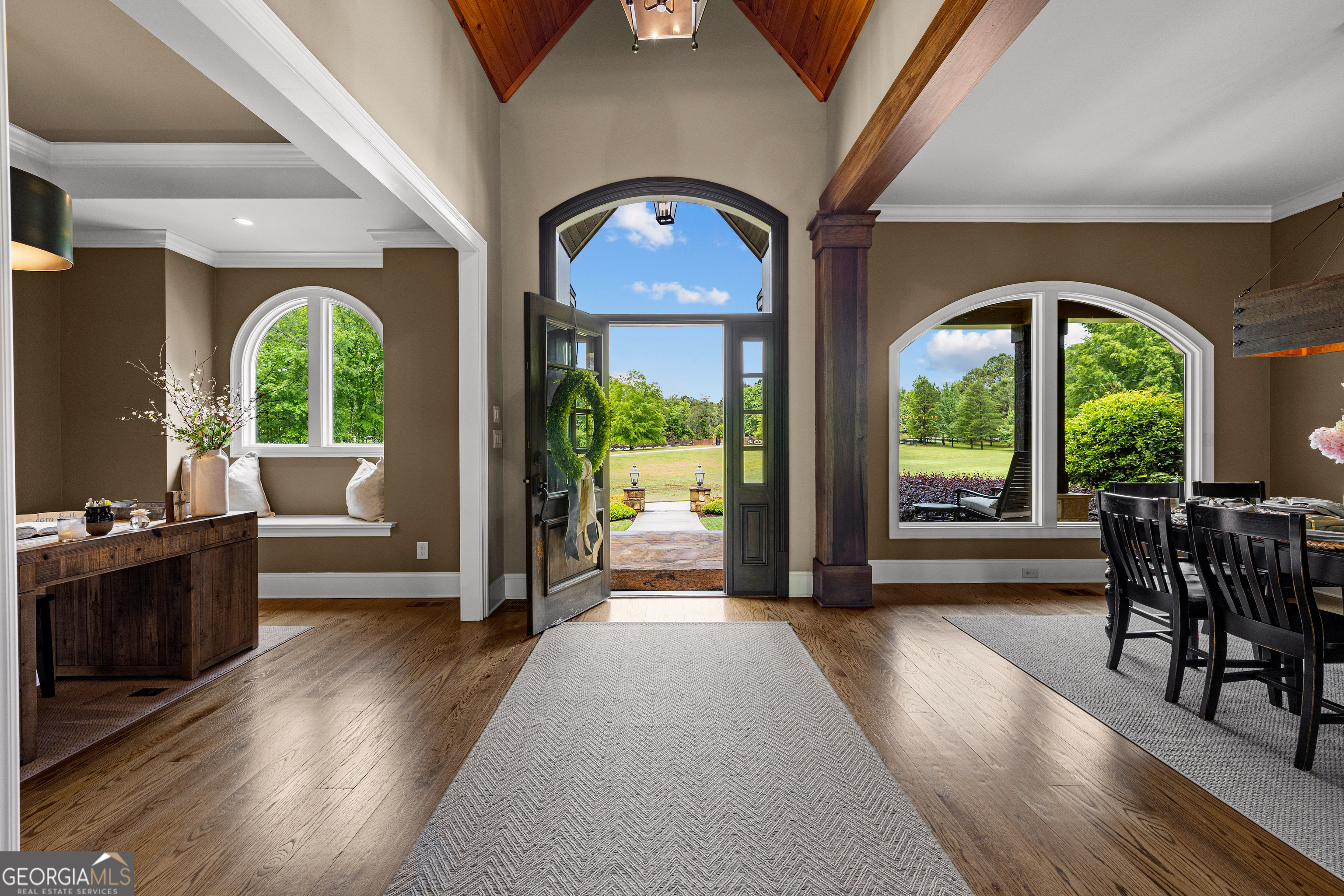 752 Grant Road Brooks, GA 30205 - Photo 29 of 132 a view of a porch with furniture wooden floor and a fireplace