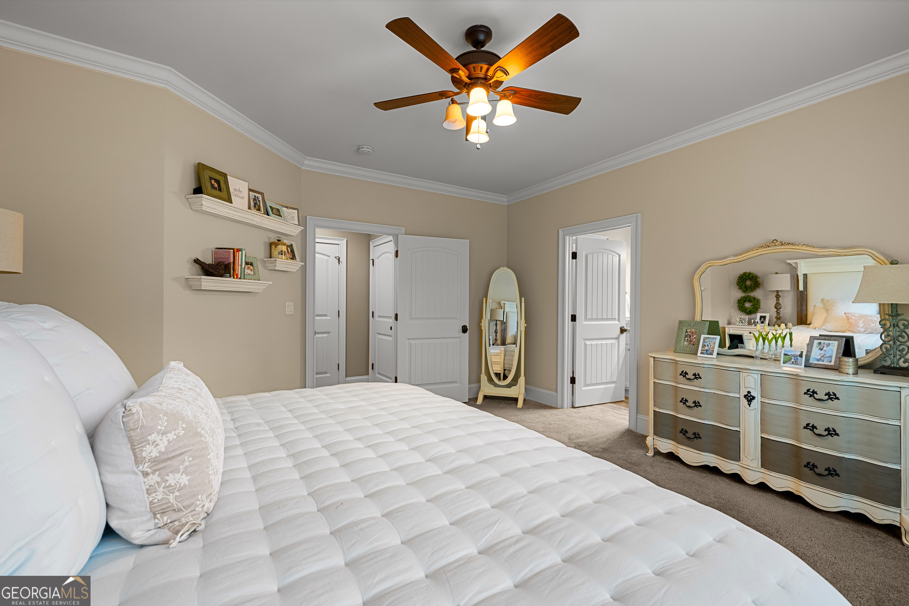 752 Grant Road Brooks, GA 30205 - Photo 55 of 132 a bedroom with a bed and a chandelier