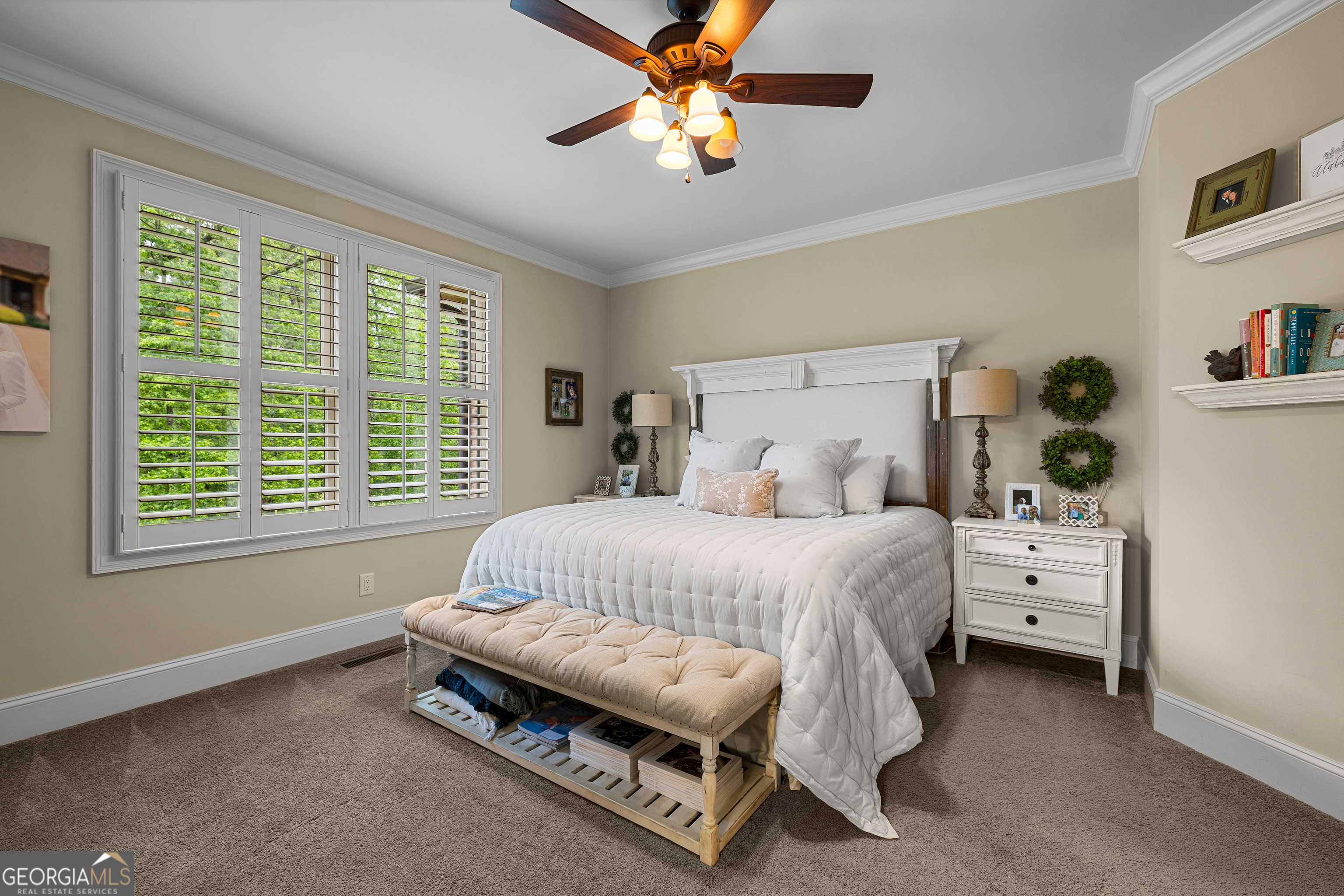 752 Grant Road Brooks, GA 30205 - Photo 56 of 132 a spacious bedroom with a bed and a chandelier