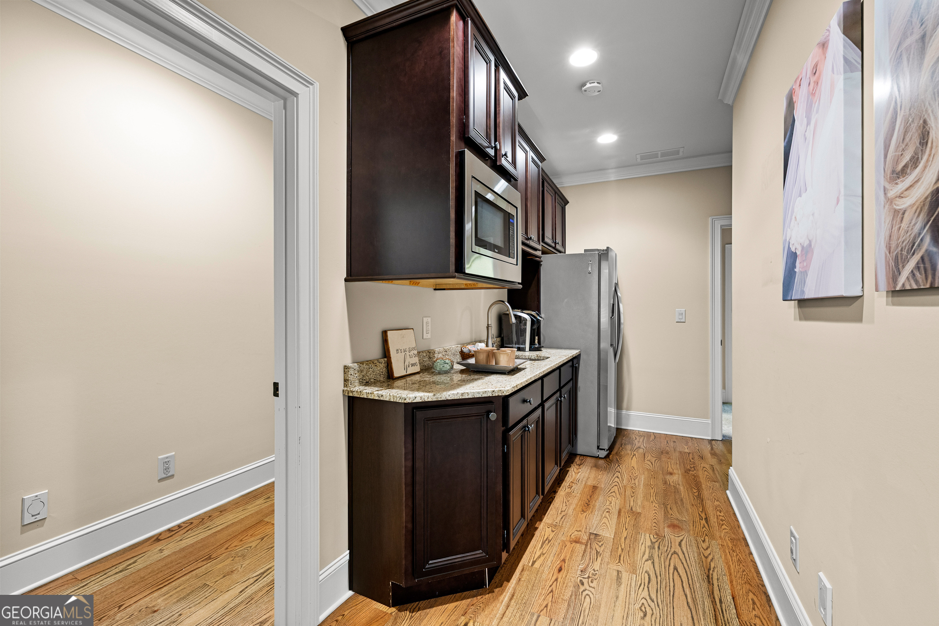 752 Grant Road Brooks, GA 30205 - Photo 68 of 132 a kitchen with stainless steel appliances granite countertop a sink and a refrigerator