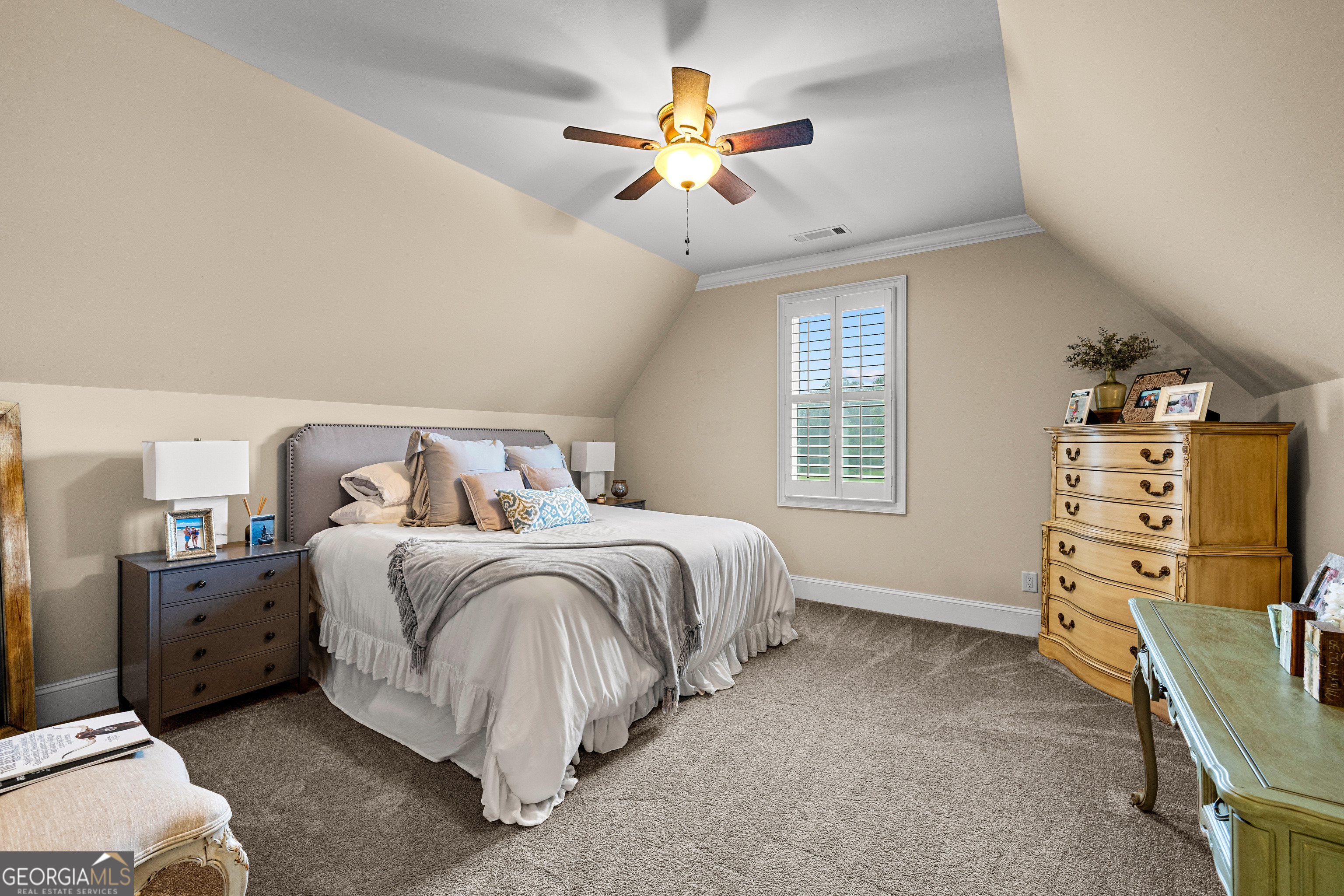 752 Grant Road Brooks, GA 30205 - Photo 70 of 132 a bed room with a bed and a ceiling fan