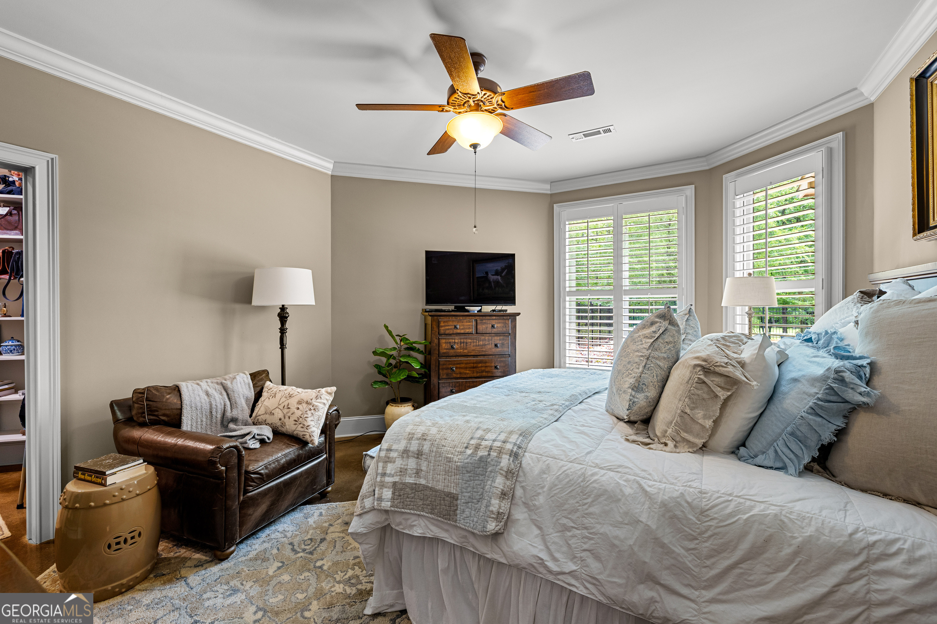 752 Grant Road Brooks, GA 30205 - Photo 82 of 132 a bedroom with a bed and a flat screen tv