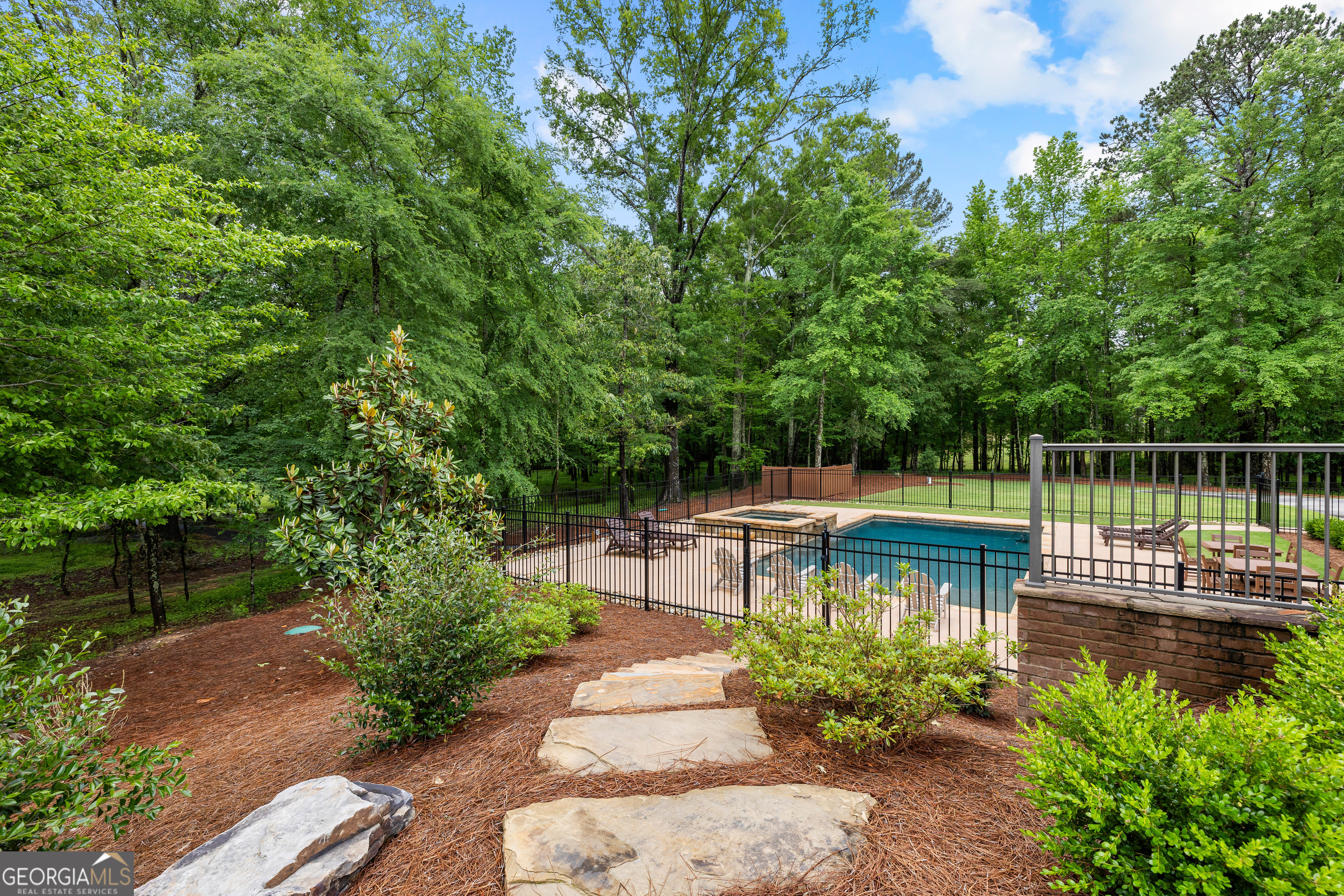 752 Grant Road Brooks, GA 30205 - Photo 95 of 132 a view of a chair and table in the garden