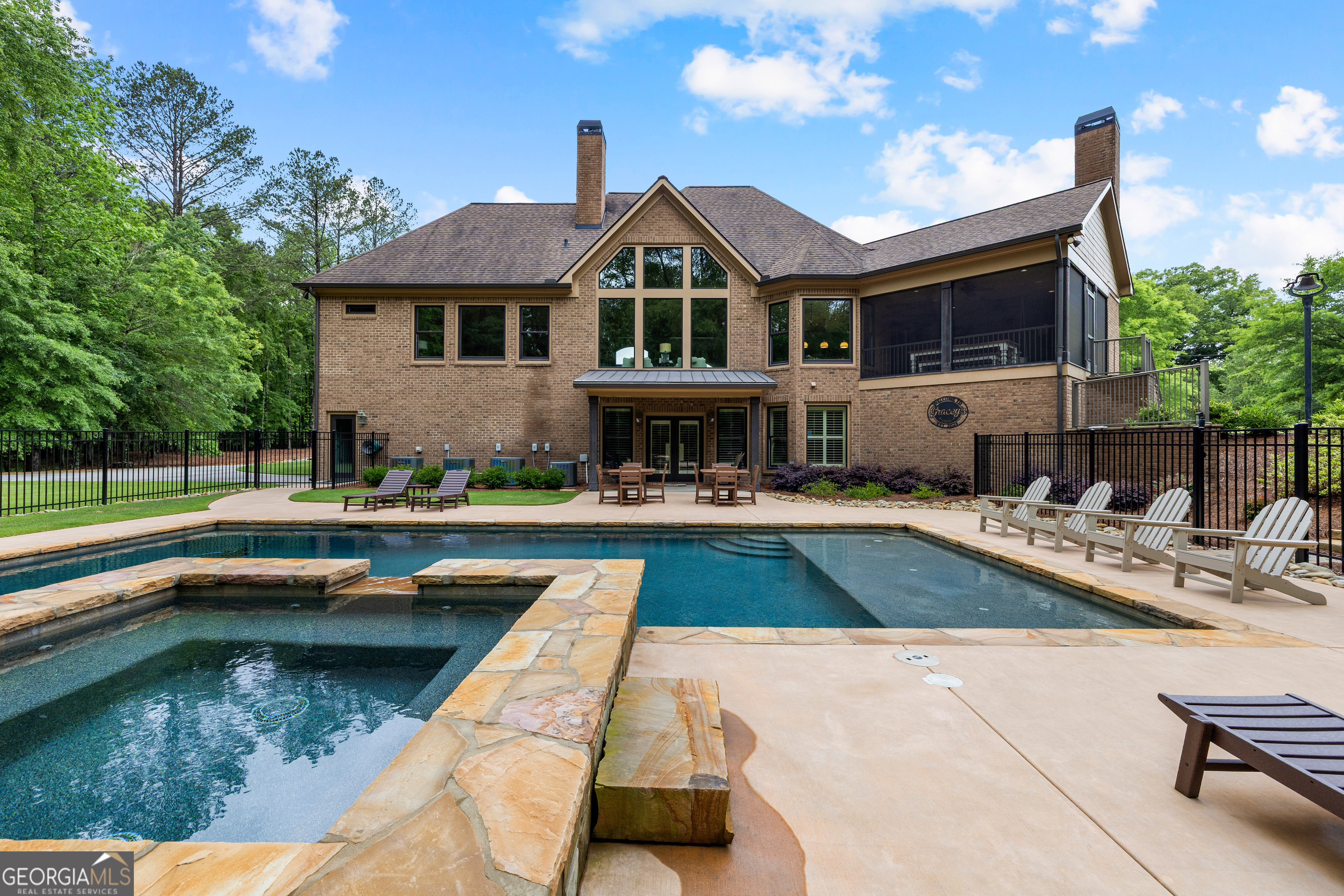 752 Grant Road Brooks, GA 30205 - Photo 98 of 132 a view of a house with swimming pool and sitting area