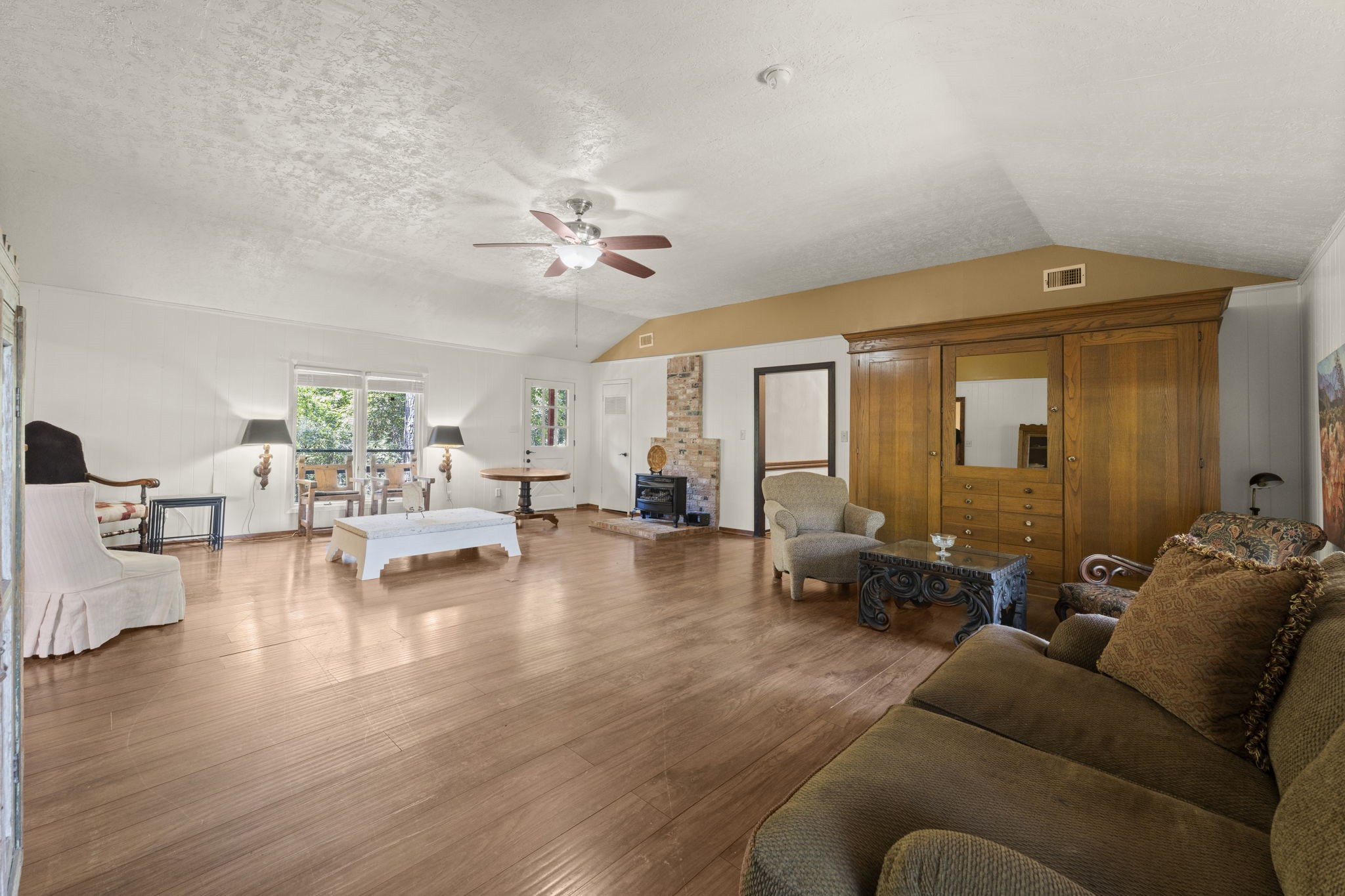 114 Hillendale Street Livingston, TX 77351 - Photo 11 of 46 a living room with furniture and a large window