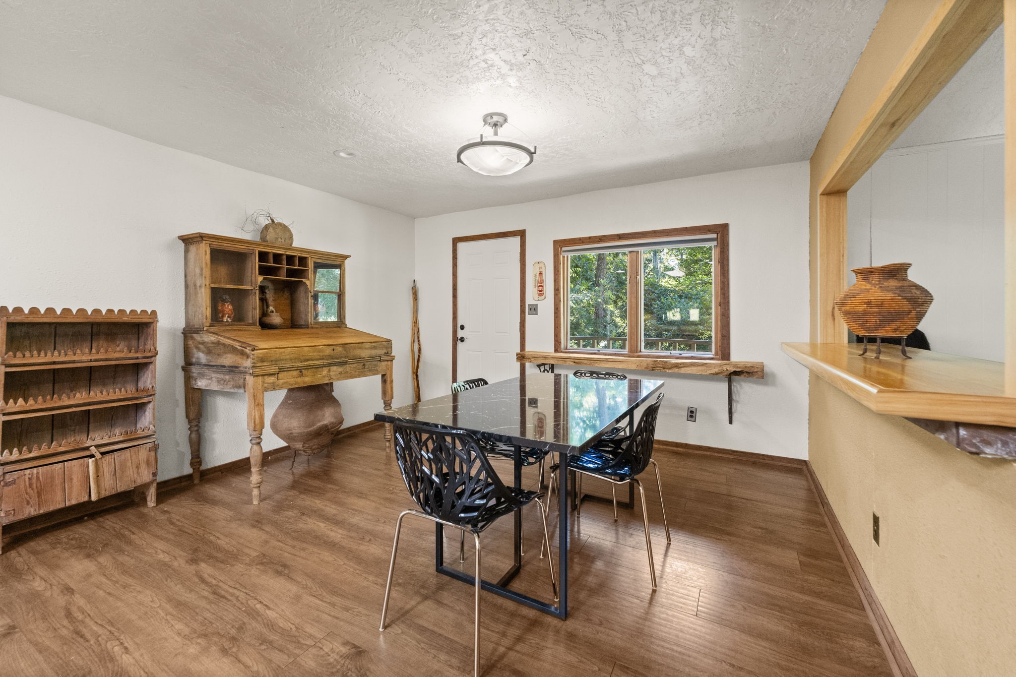 114 Hillendale Street Livingston, TX 77351 - Photo 19 of 46 a dining room with furniture and wooden floor