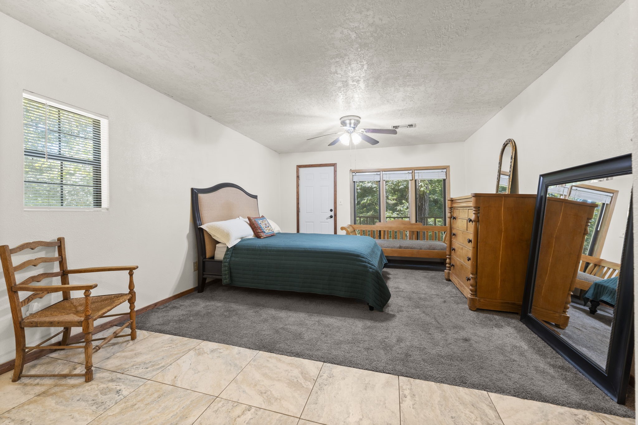 114 Hillendale Street Livingston, TX 77351 - Photo 22 of 46 a bedroom with a bed and a television