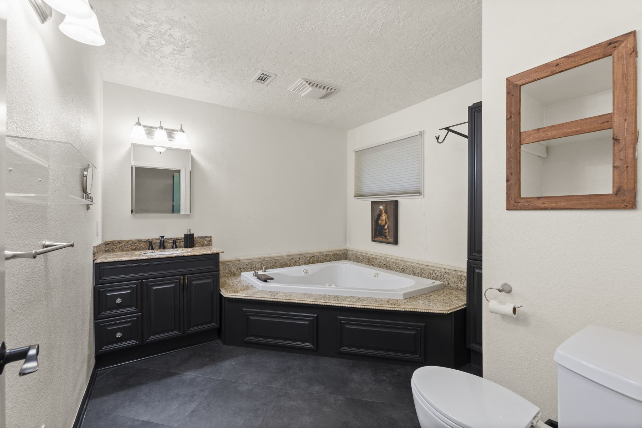 114 Hillendale Street Livingston, TX 77351 - Photo 29 of 46 a bathroom with a sink a toilet and mirror