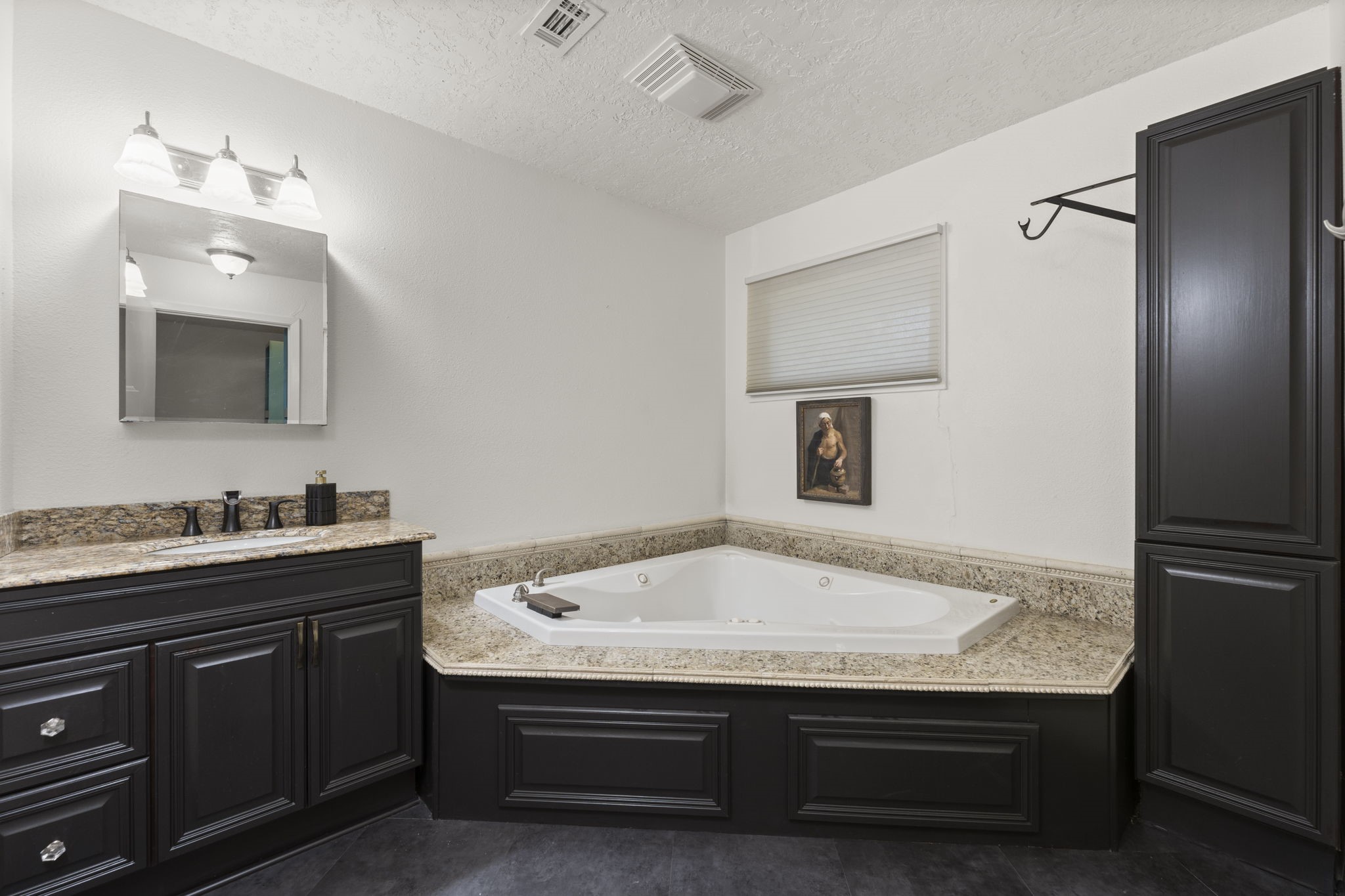 114 Hillendale Street Livingston, TX 77351 - Photo 30 of 46 a bathroom with a sink and a mirror