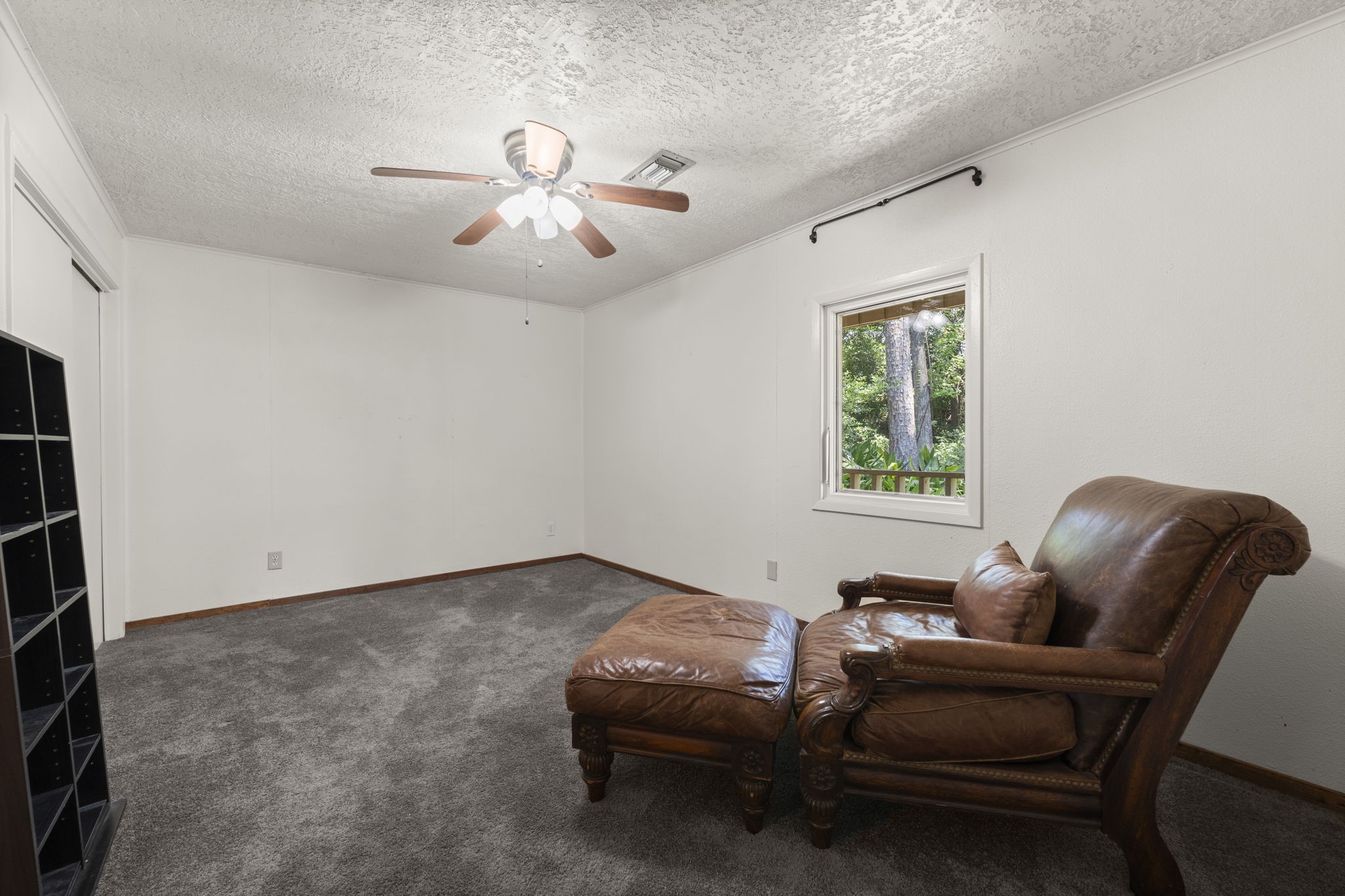 114 Hillendale Street Livingston, TX 77351 - Photo 31 of 46 a living room with furniture and a window