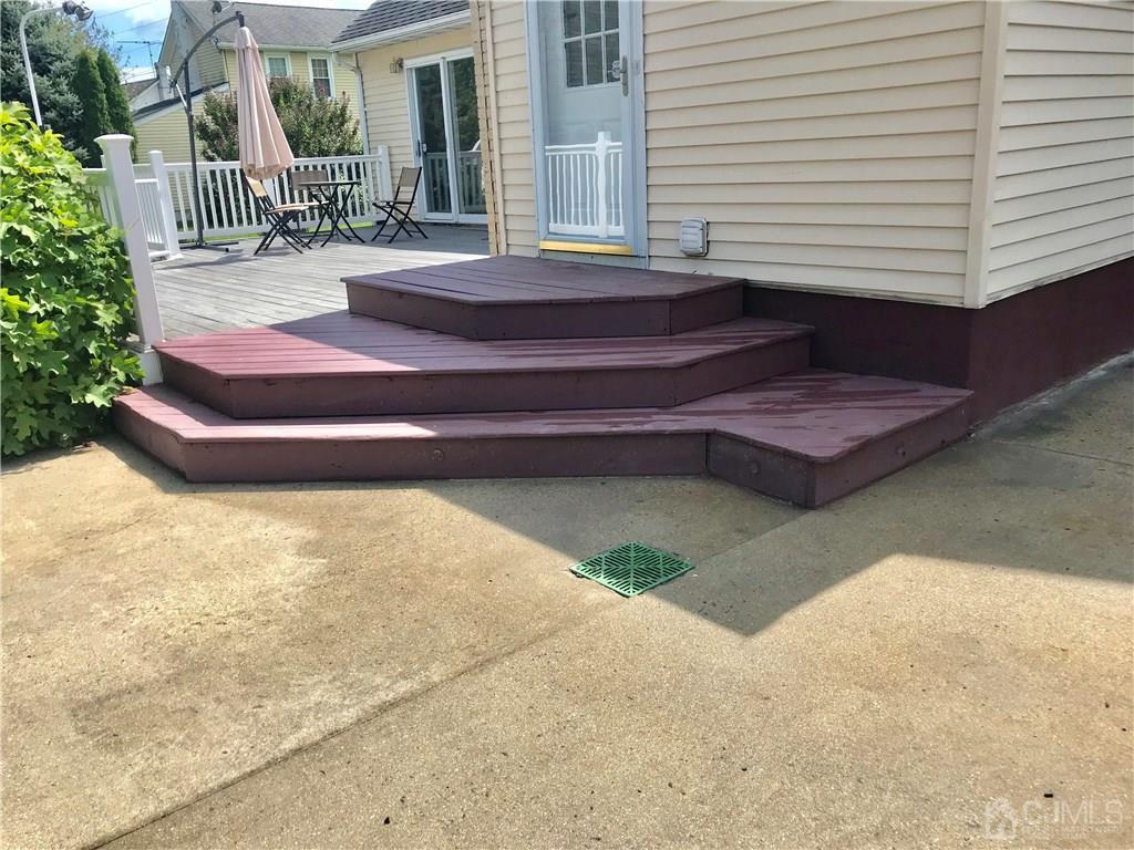 398 Ridge Road Dayton, NJ 08810 - Photo 17 of 19 a front view of a house with garden