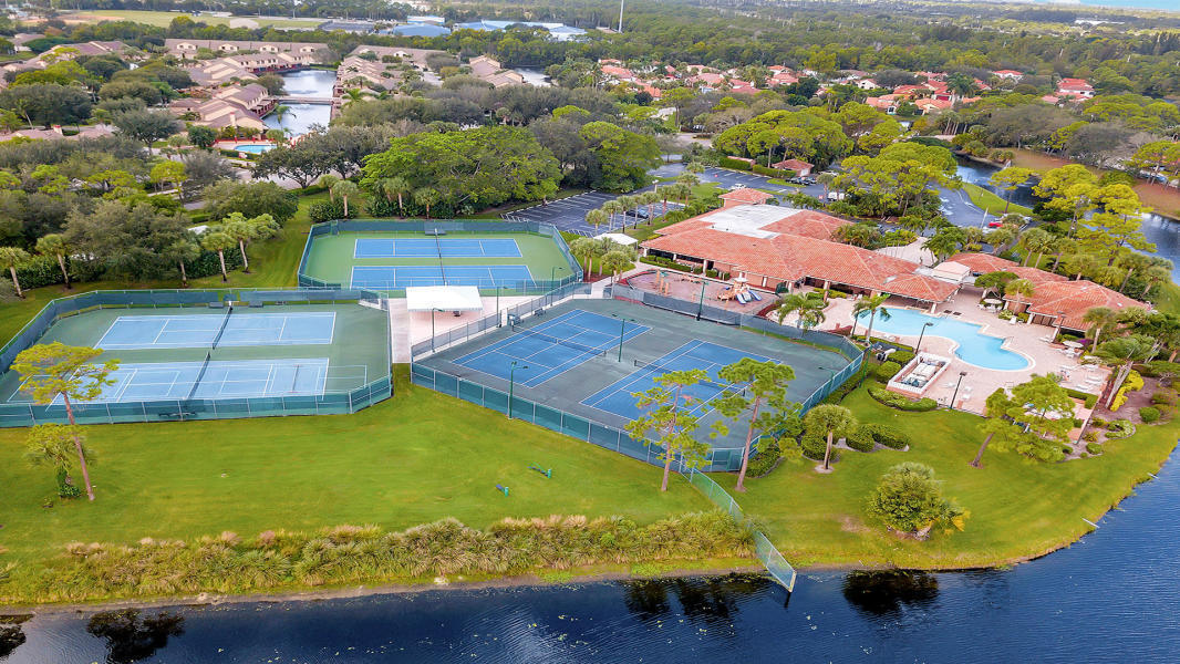 903 Harbour Pointe Way Greenacres, FL 33413 - Photo 18 of 26 an aerial view of a pool patio swimming pool and outdoor seating