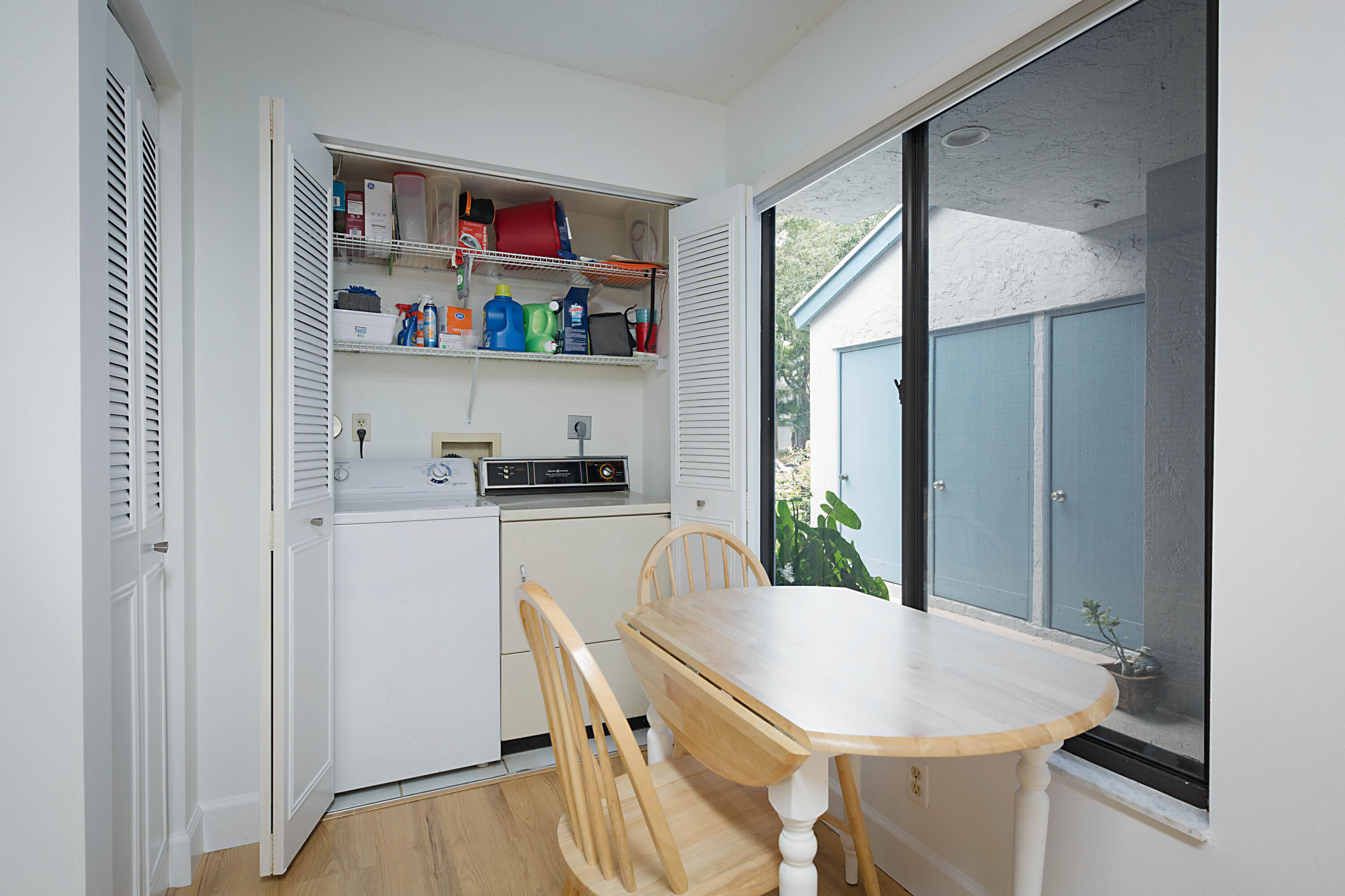 903 Harbour Pointe Way Greenacres, FL 33413 - Photo 5 of 26 a dining room with furniture and window